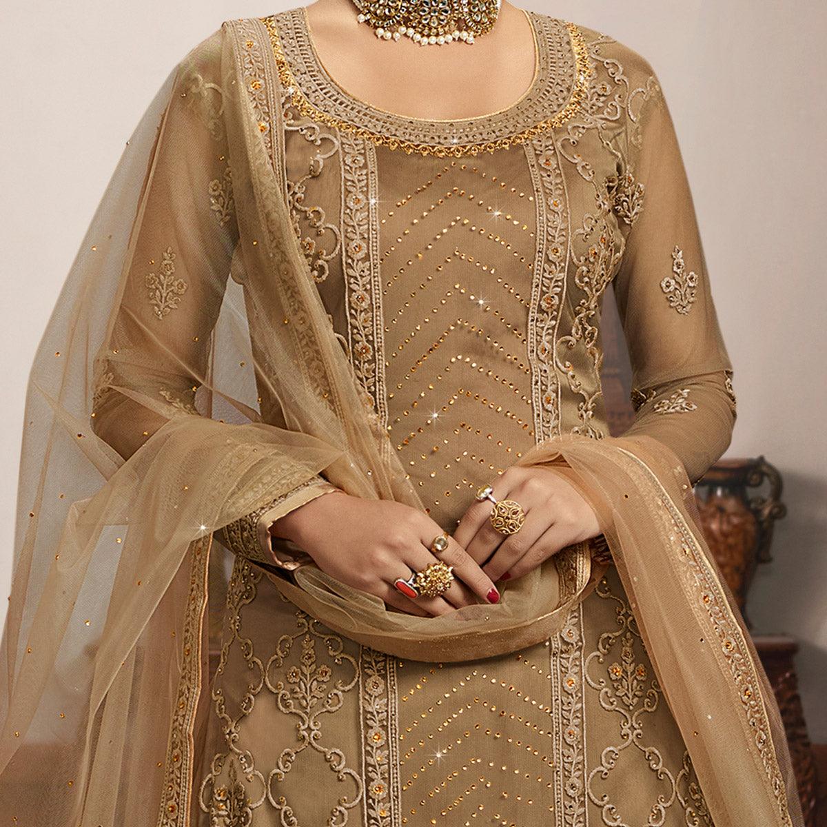 Jazzy Beige Coloured Partywear Embroidered Super Net Sharara Style Salwar Suit