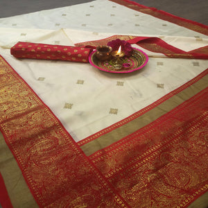 Jazzy Cream-Red Colored Festive Wear Paisely Foli Print Patola Silk Saree