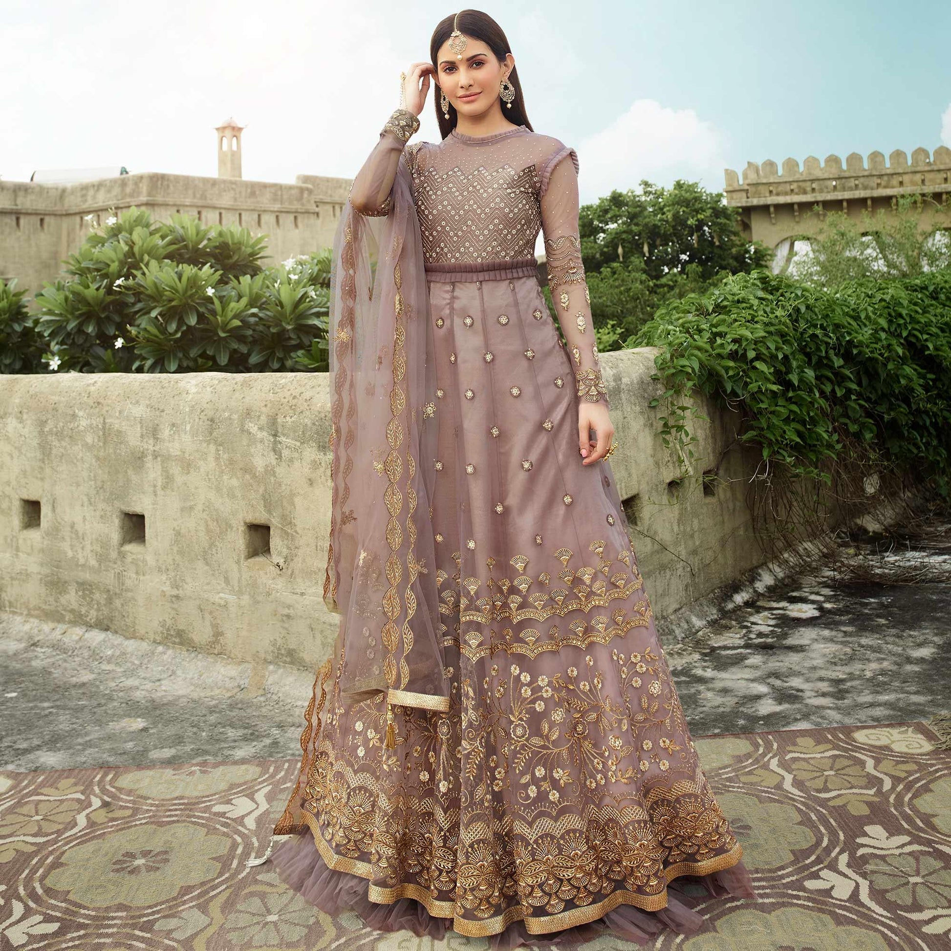 Jazzy Mauve Coloured Partywear Embroidered Net Anarkali Suit