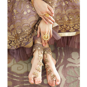 Jazzy Mauve Coloured Partywear Embroidered Net Anarkali Suit