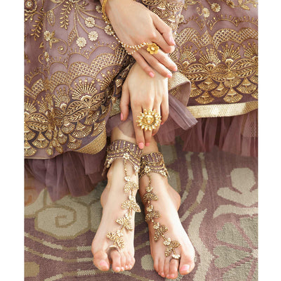 Jazzy Mauve Coloured Partywear Embroidered Net Anarkali Suit