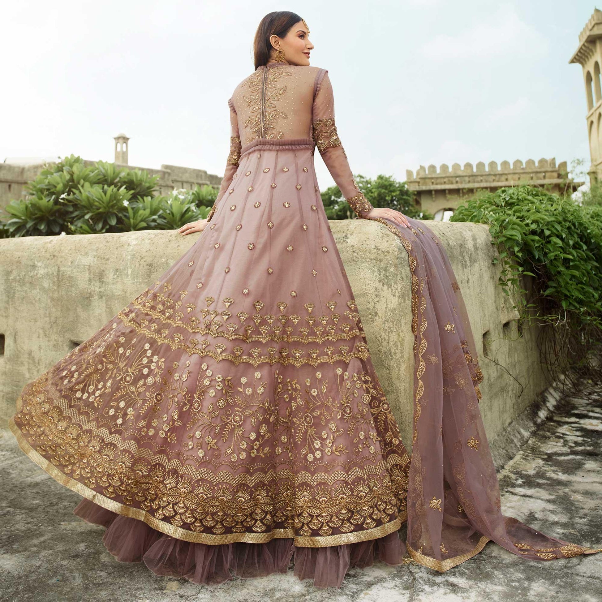 Jazzy Mauve Coloured Partywear Embroidered Net Anarkali Suit