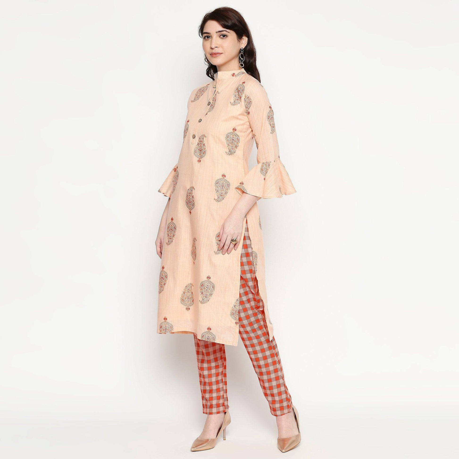 Jazzy Peach Colored Casual Wear Printed Cotton Kurti-Pant Set