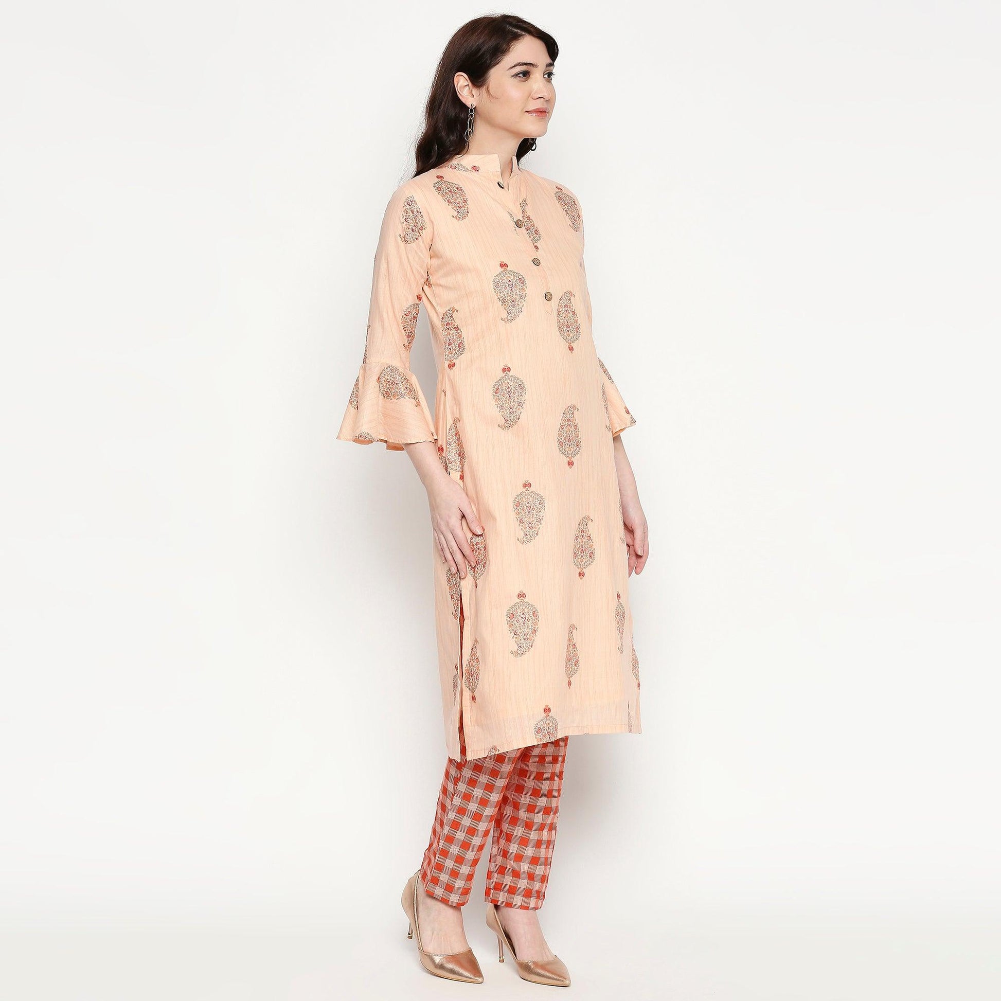 Jazzy Peach Colored Casual Wear Printed Cotton Kurti-Pant Set