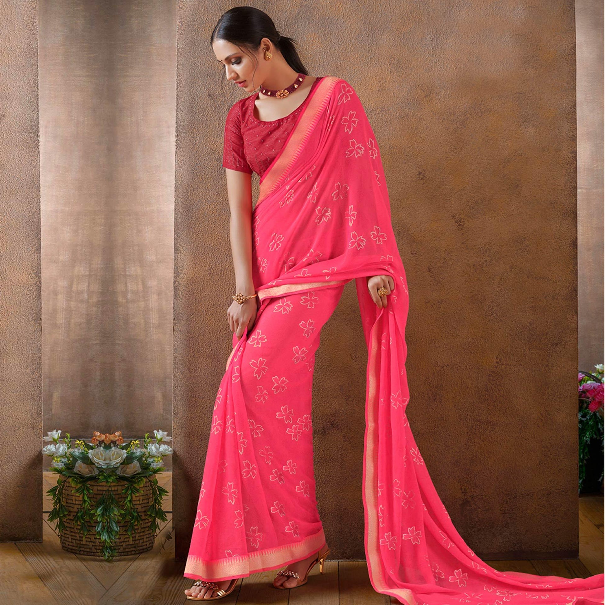 Jazzy Pink Colored Festive Wear Foil Printed Georgette Saree