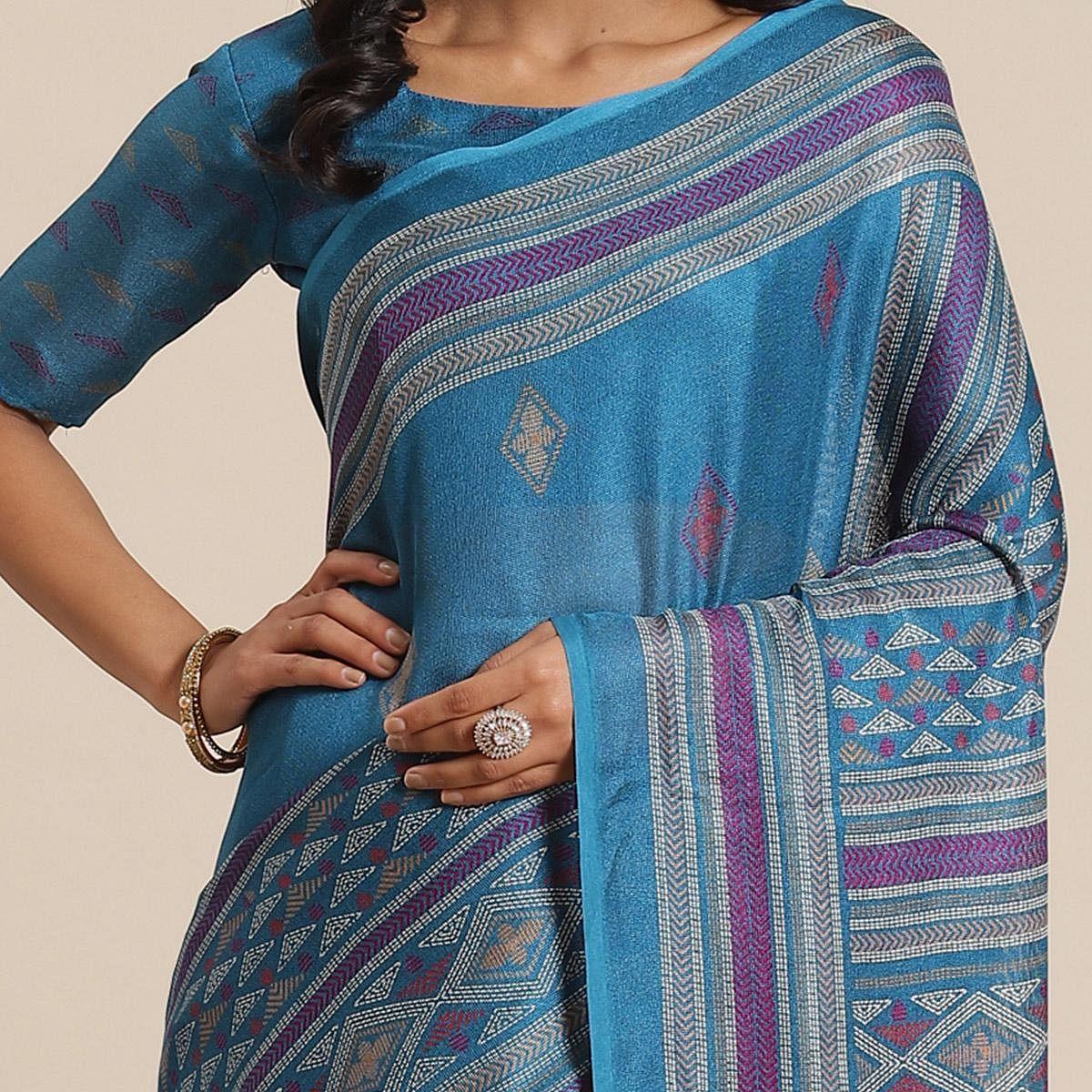 Jazzy Teal Blue Colored Casual Wear Printed Jute Silk Saree