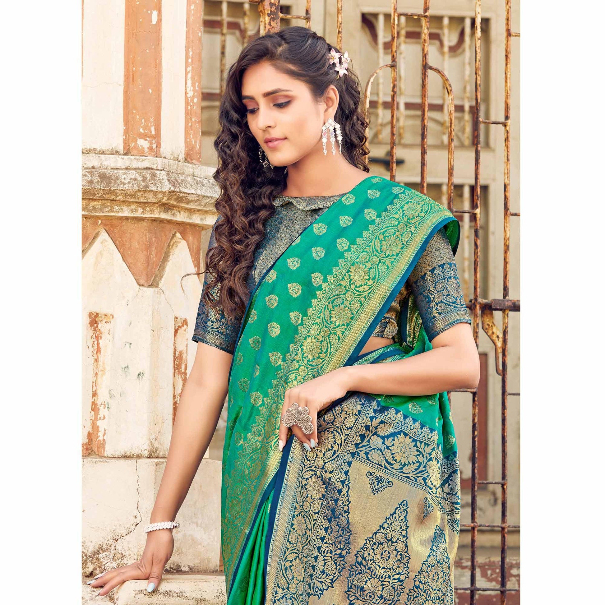 Jazzy Turqouise Coloured Designer Partywear Weaving Silk Saree