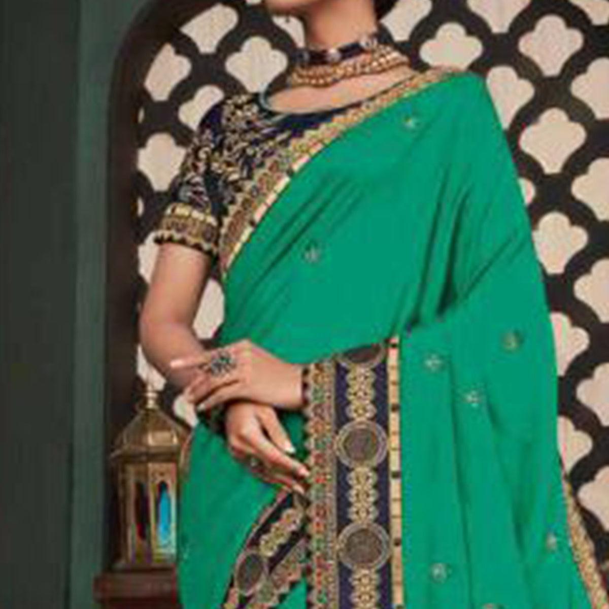 Jazzy Turquoise Green Colored Festive Wear Embroidered Heavy Border Silk Saree