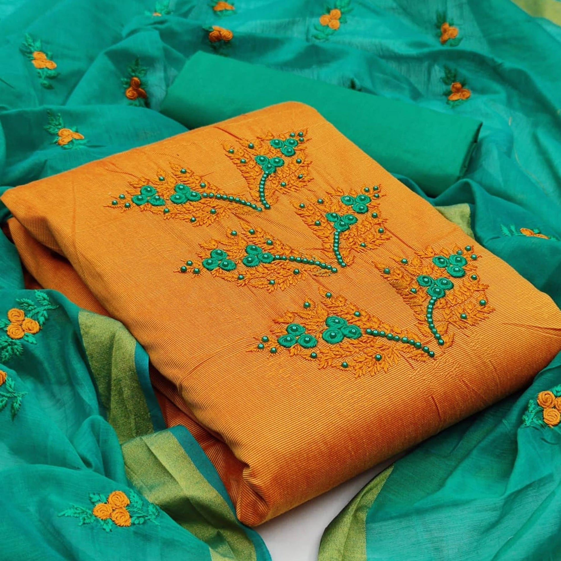 Jazzy Yellow Colored Casual Wear Embroidered Cotton Dress Material