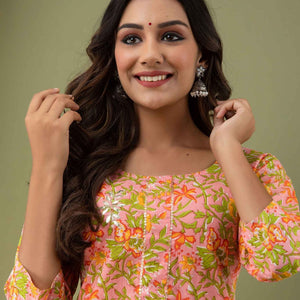 Women Peach Floral Kurti with Pant