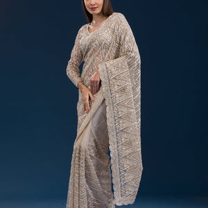 Beige Sequins Net Saree