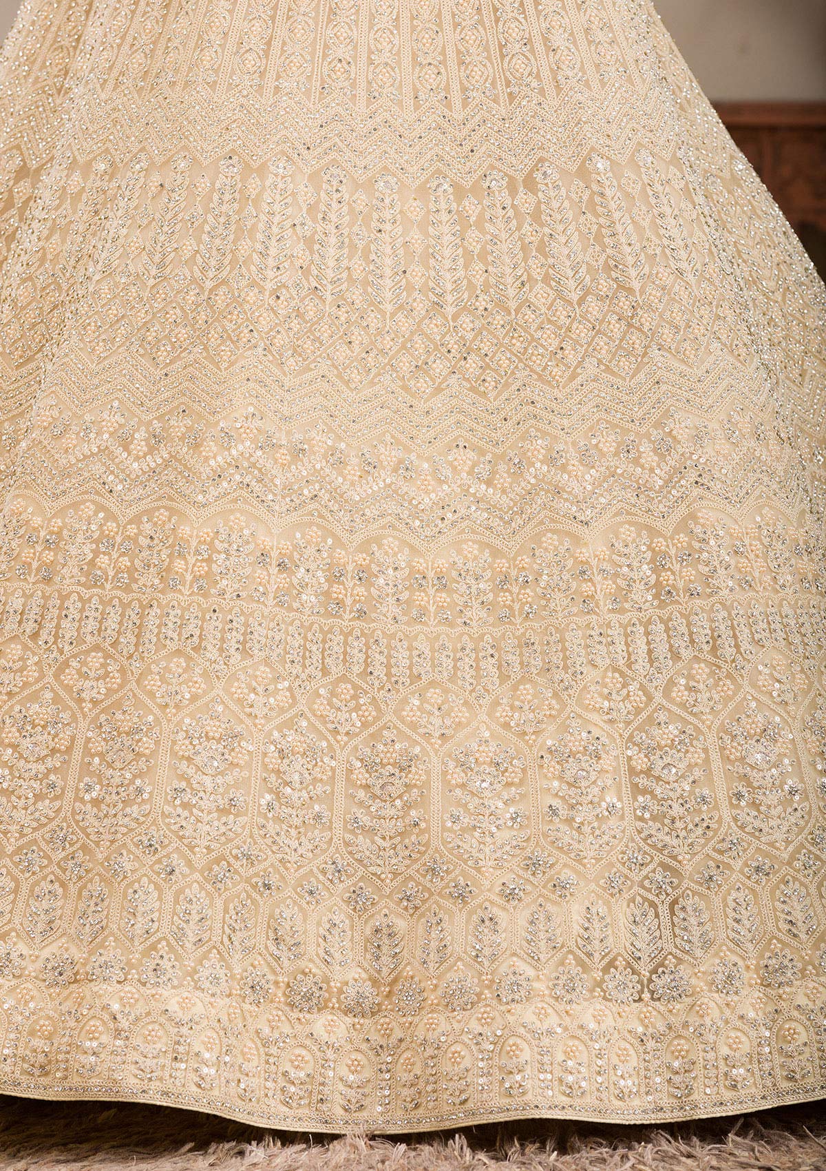 Cream Silver Stonework Net Readymade Lehenga