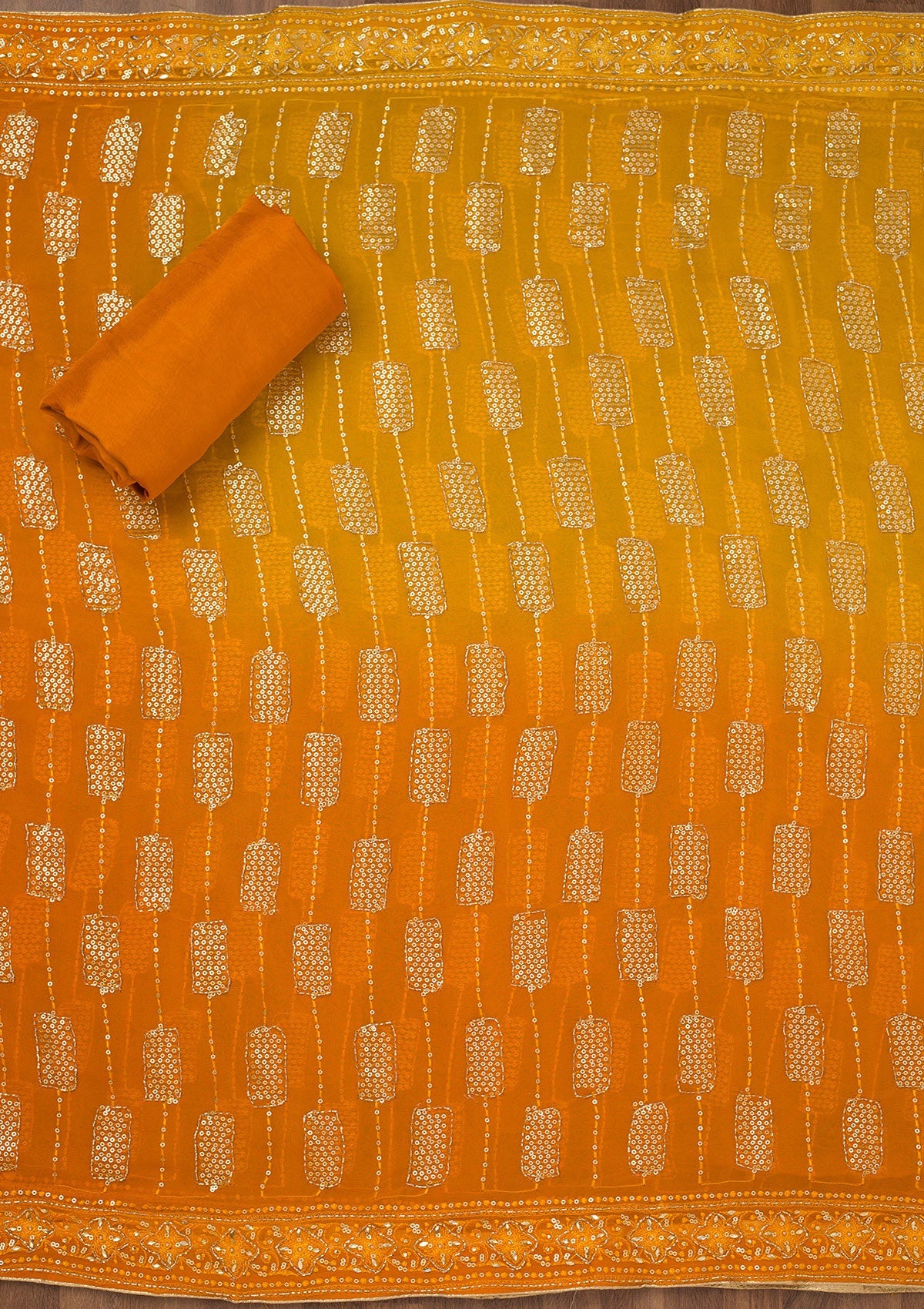 Orange Printed Semi Crepe Unstitched Salwar Suit