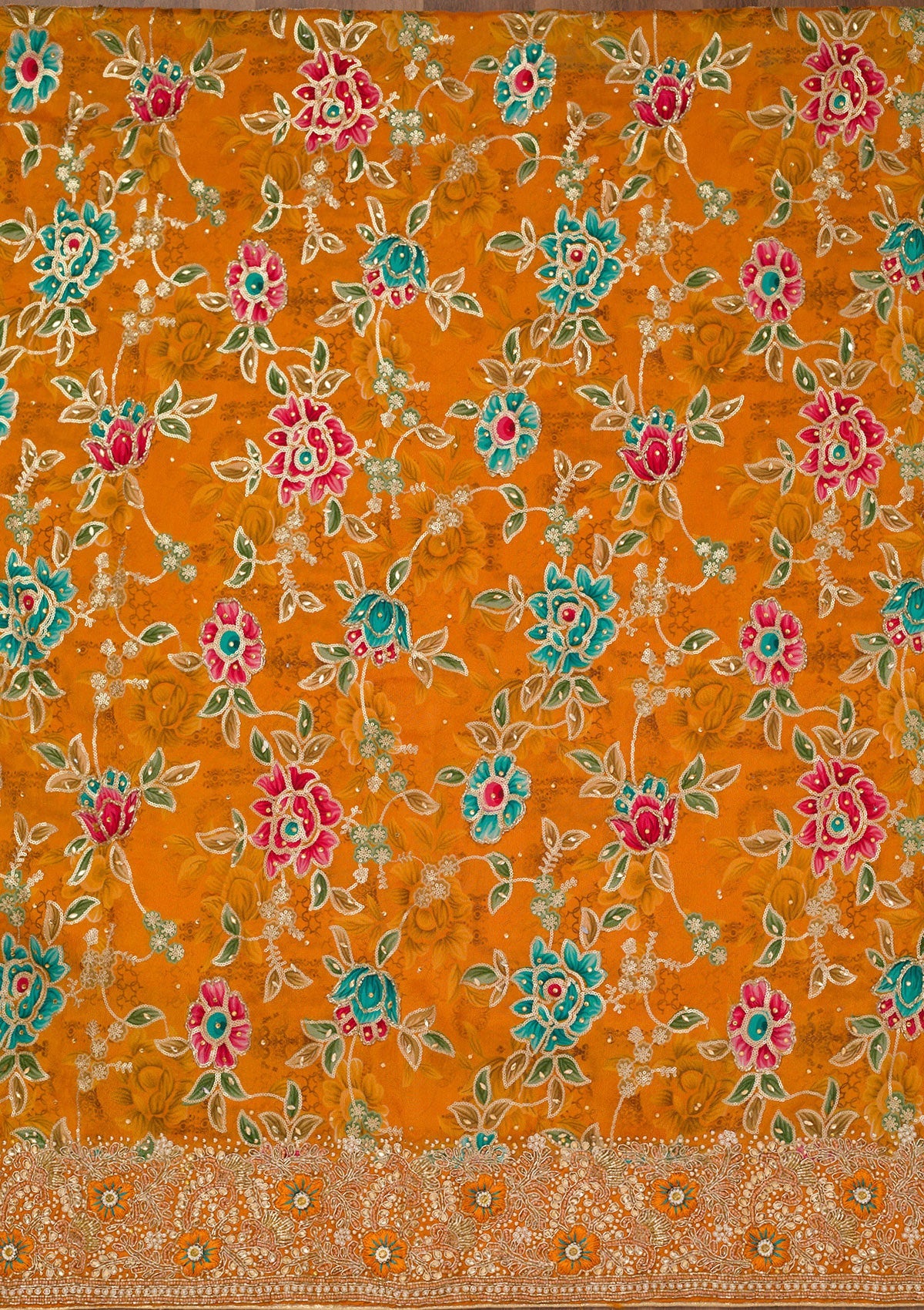 Orange Printed Semi Crepe Unstitched Salwar Suit