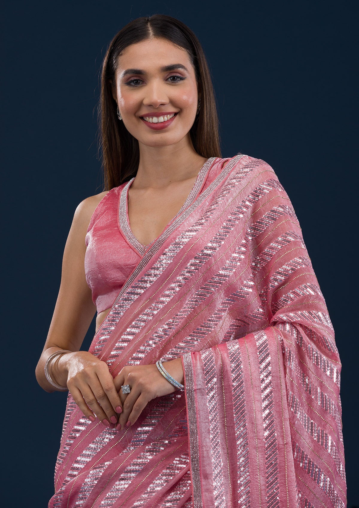 Peach Sequins Semi Crepe Saree