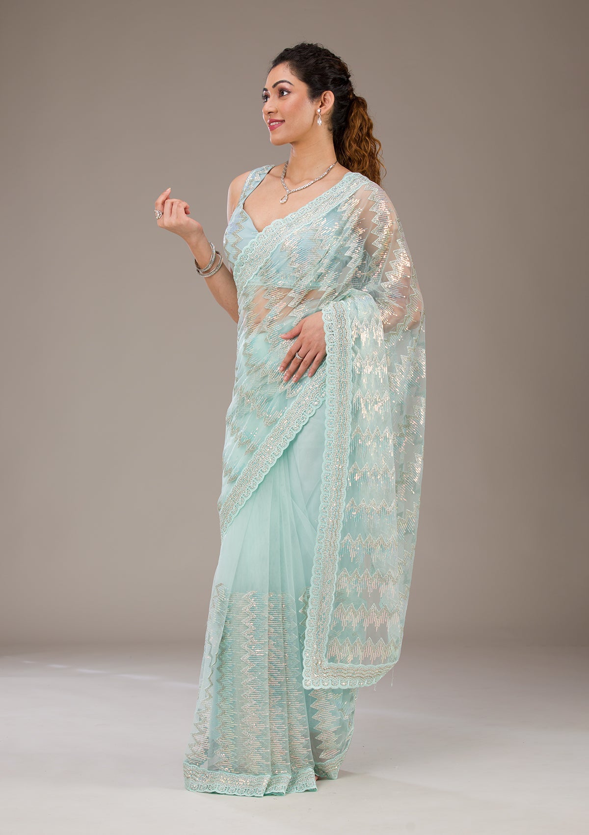 Pista Green Sequins Net Saree