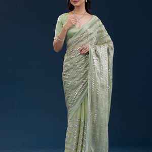 Pista Green Zariwork Semi Crepe Saree