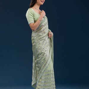 Pista Green Zariwork Semi Crepe Saree