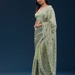 Pista Green Zariwork Semi Crepe Saree