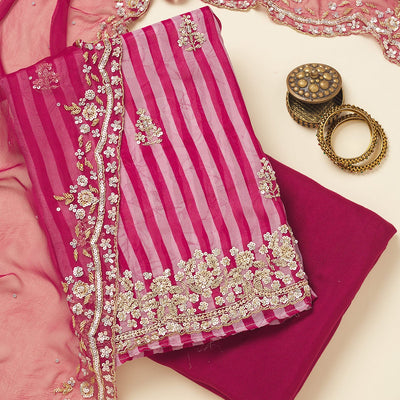 Rani Pink Cutdana Semi Crepe Unstitched Salwar Suit