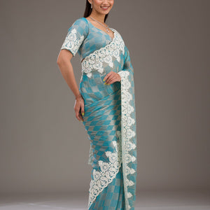 Turquoise Blue Pearlwork Tissue Saree