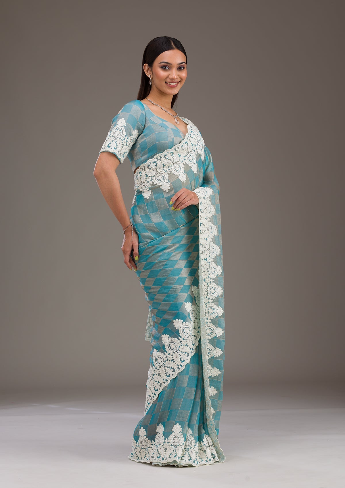 Turquoise Blue Pearlwork Tissue Saree