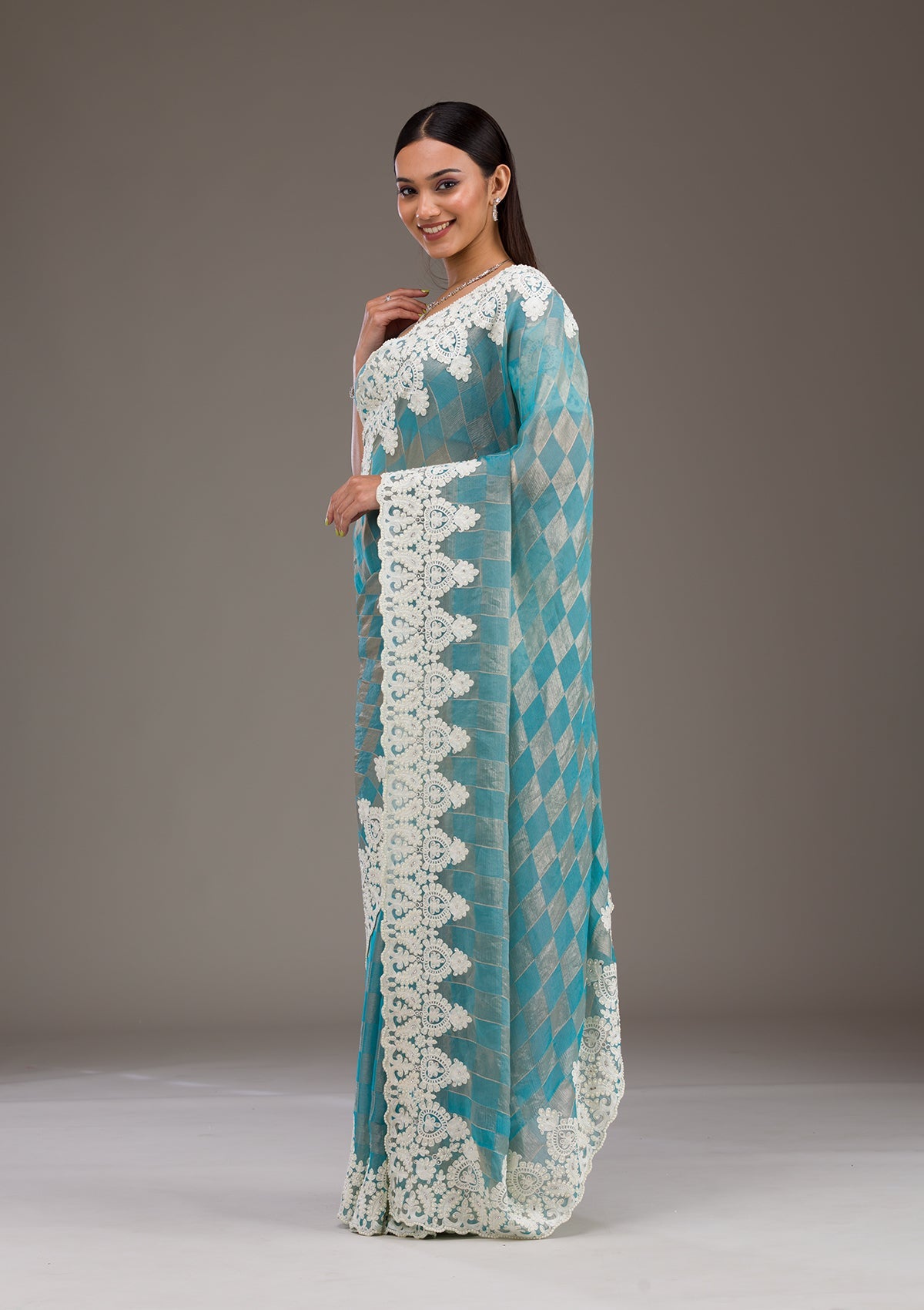 Turquoise Blue Pearlwork Tissue Saree