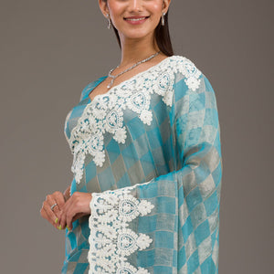 Turquoise Blue Pearlwork Tissue Saree