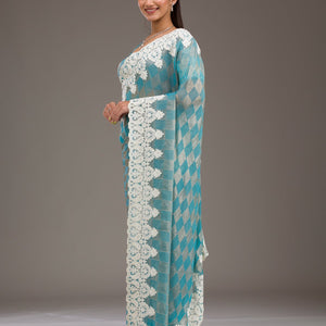 Turquoise Blue Pearlwork Tissue Saree