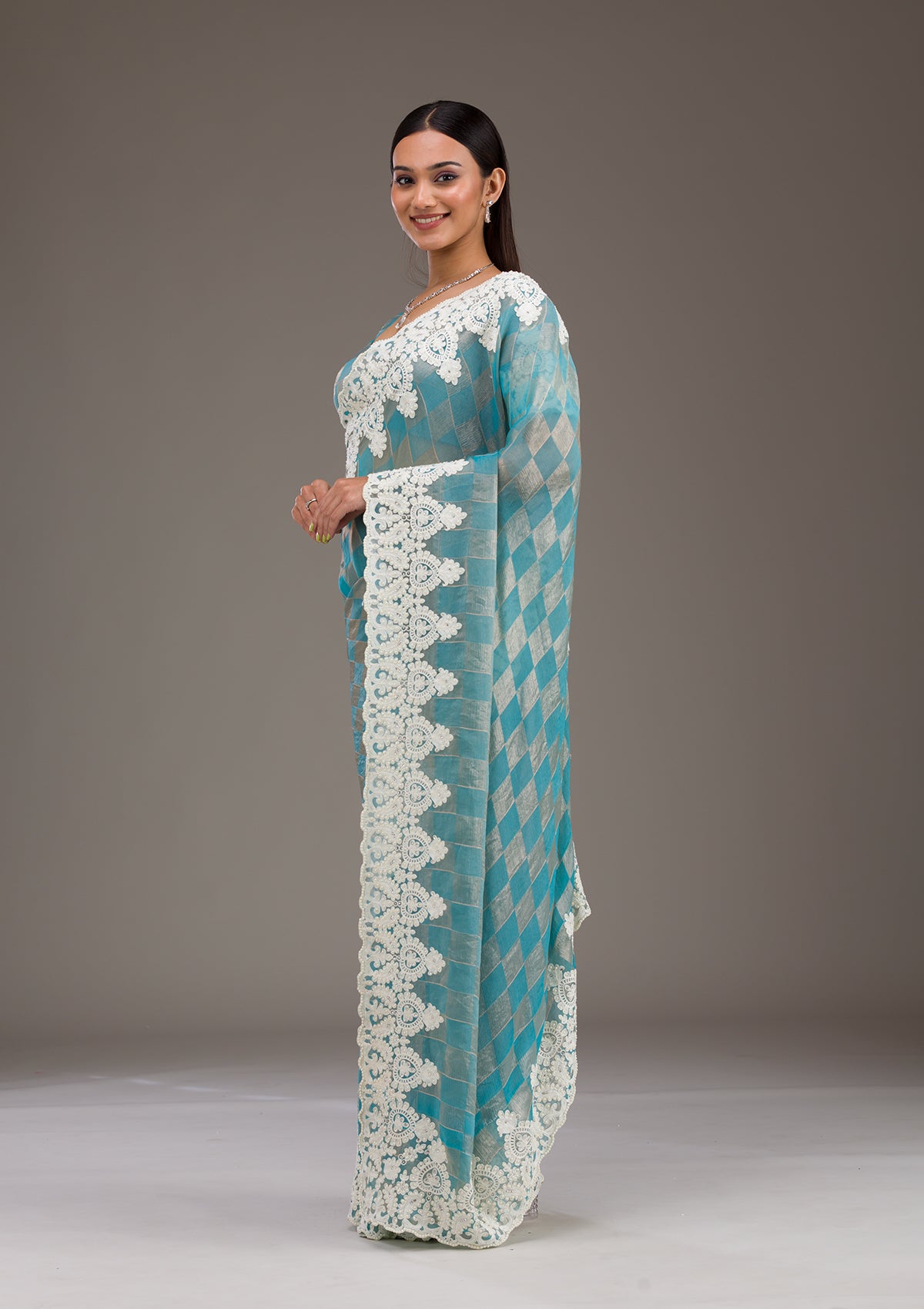 Turquoise Blue Pearlwork Tissue Saree