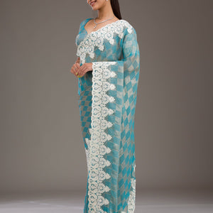 Turquoise Blue Pearlwork Tissue Saree