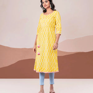 Yellow pin tuck cotton kurta with rope tassel tie up