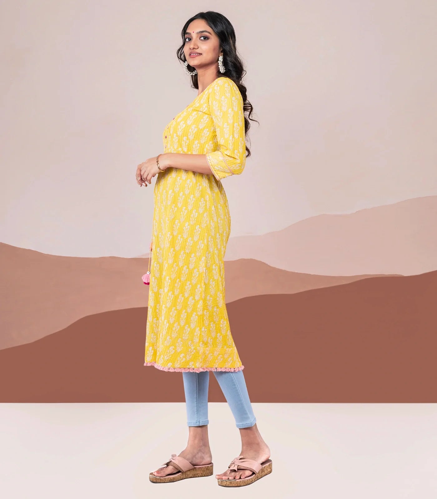 Yellow pin tuck cotton kurta with rope tassel tie up