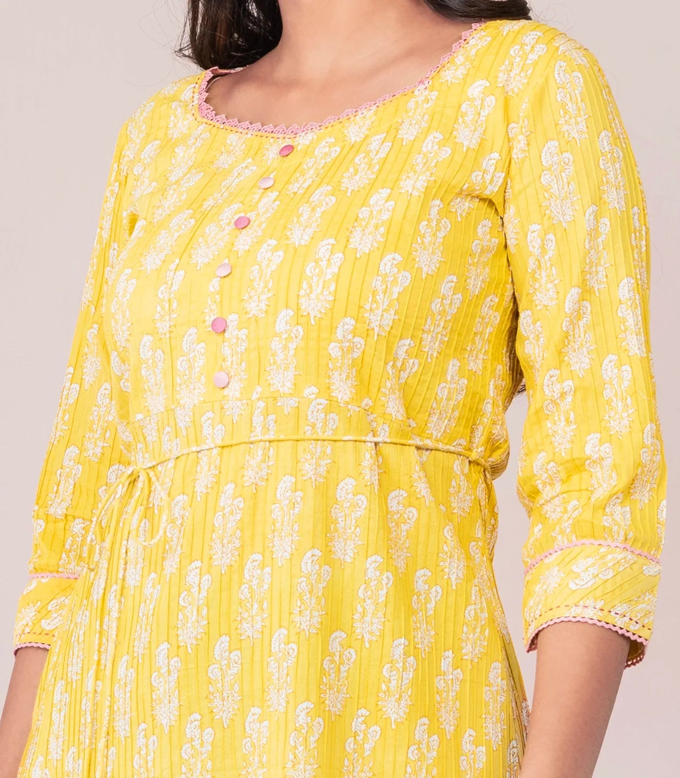 Yellow pin tuck cotton kurta with rope tassel tie up