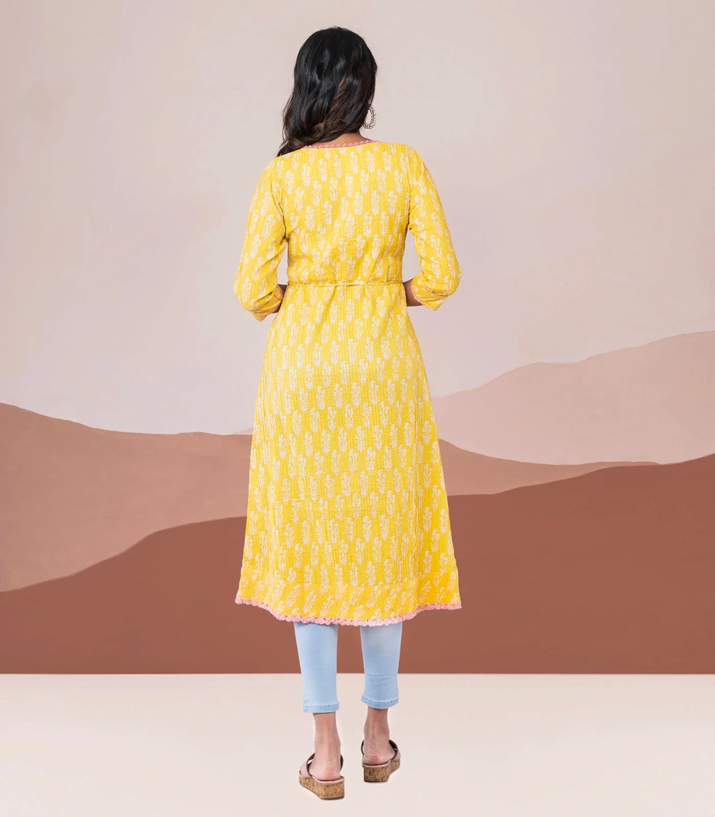 Yellow pin tuck cotton kurta with rope tassel tie up