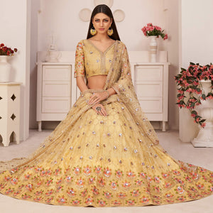 Lemon Yellow Party Wear Embroidered Netted Lehenga Choli