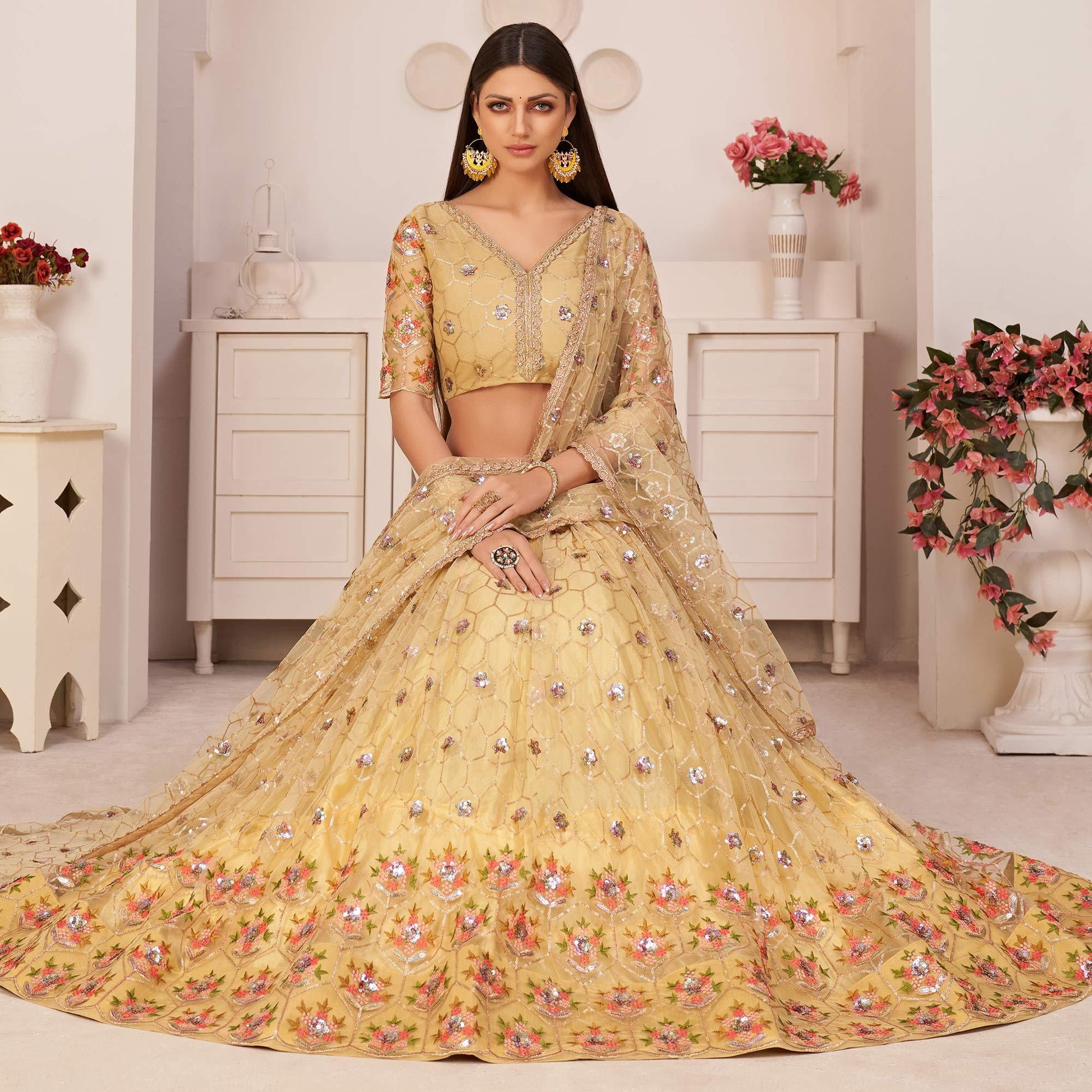 Lemon Yellow Party Wear Embroidered Netted Lehenga Choli