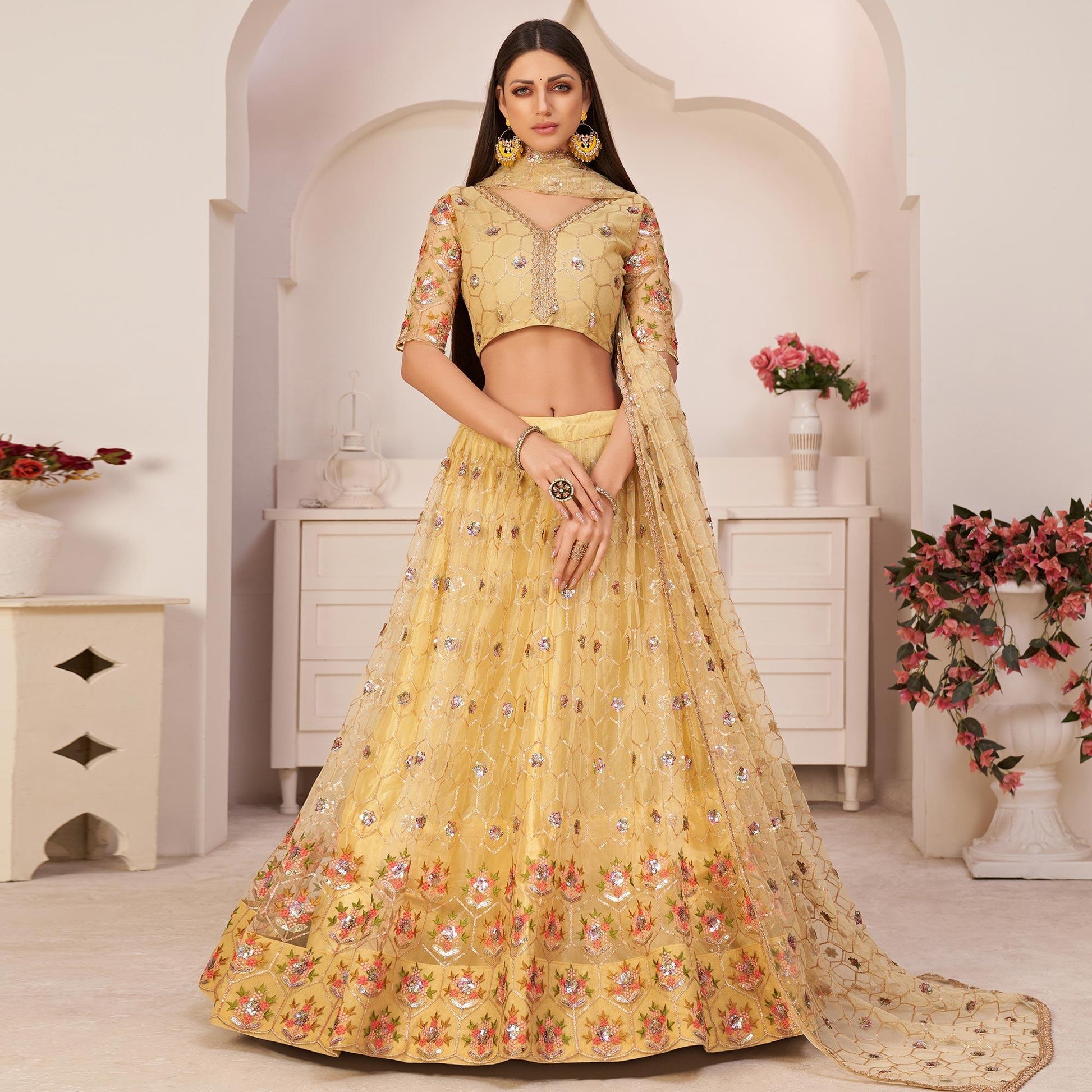 Lemon Yellow Party Wear Embroidered Netted Lehenga Choli
