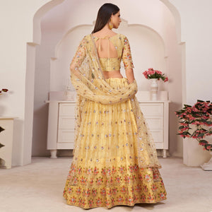 Lemon Yellow Party Wear Embroidered Netted Lehenga Choli