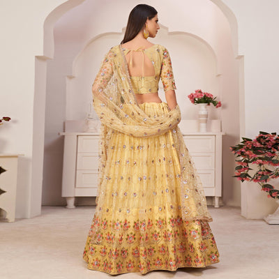 Lemon Yellow Party Wear Embroidered Netted Lehenga Choli
