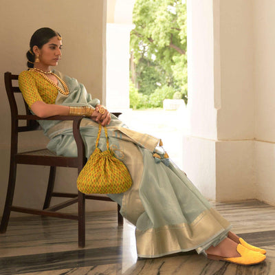 Light Blue Woven Organza Saree With Tassels