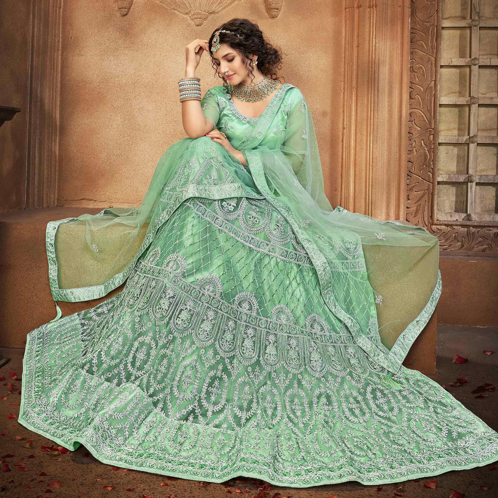 Light Green  Partywear Multi Sequins Embroidered Net Lehenga Choli