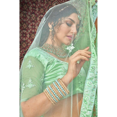 Light Green  Partywear Multi Sequins Embroidered Net Lehenga Choli