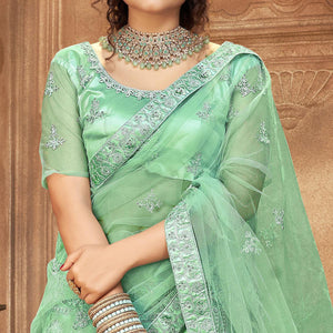 Light Green  Partywear Multi Sequins Embroidered Net Lehenga Choli