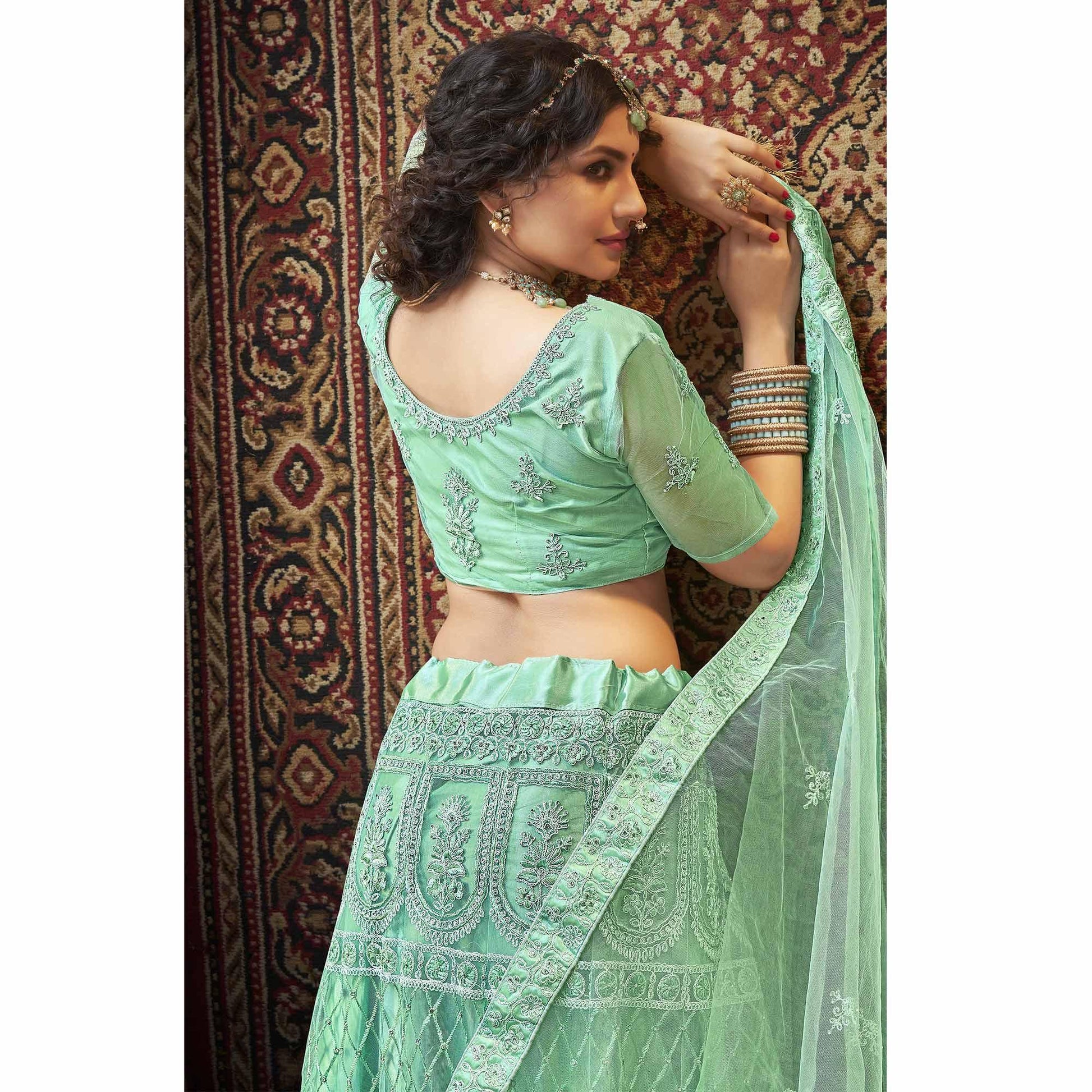 Light Green  Partywear Multi Sequins Embroidered Net Lehenga Choli