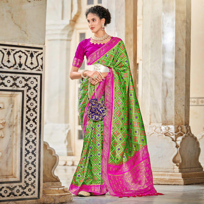 Light Green Woven Art Silk Patola Saree With Tassels