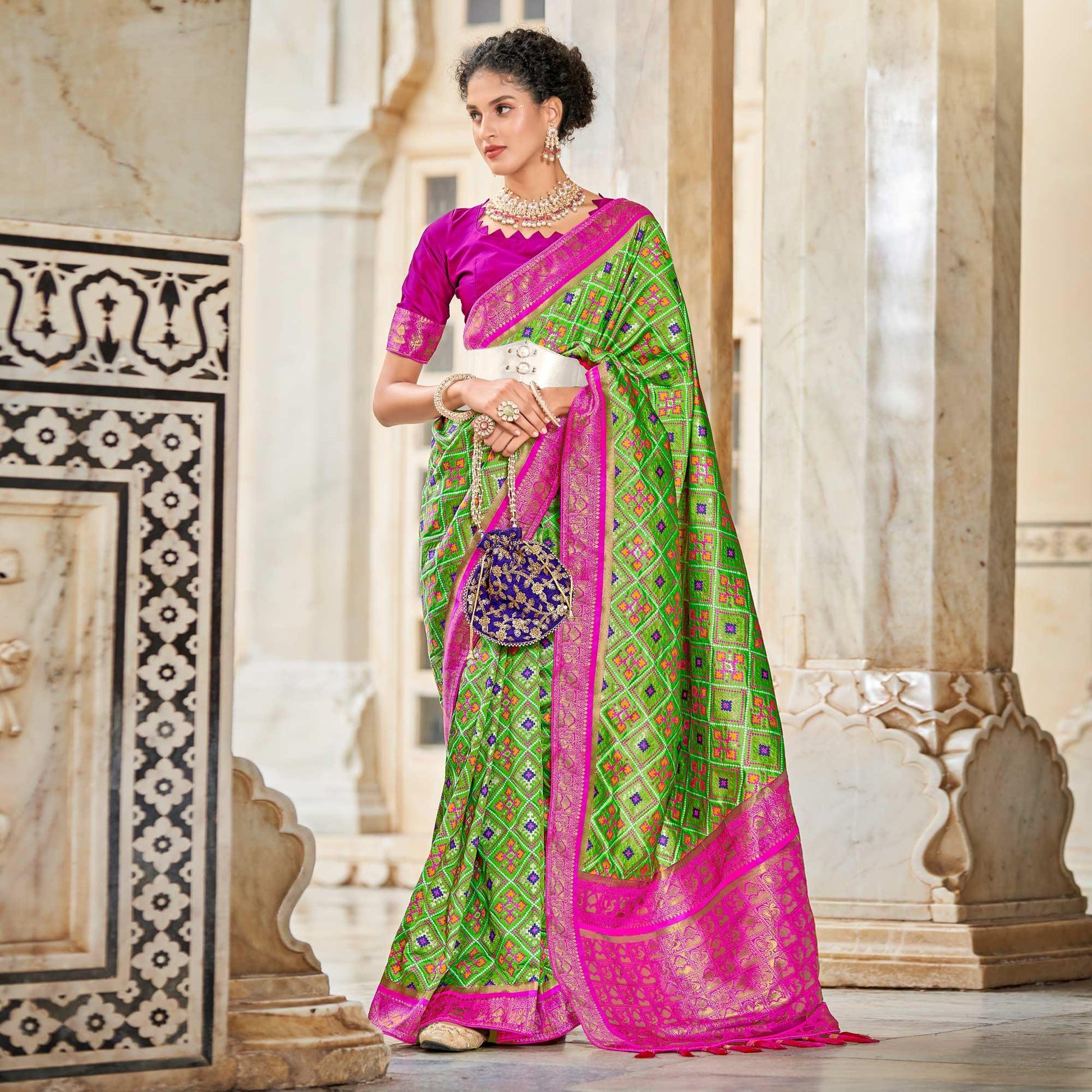 Light Green Woven Art Silk Patola Saree With Tassels