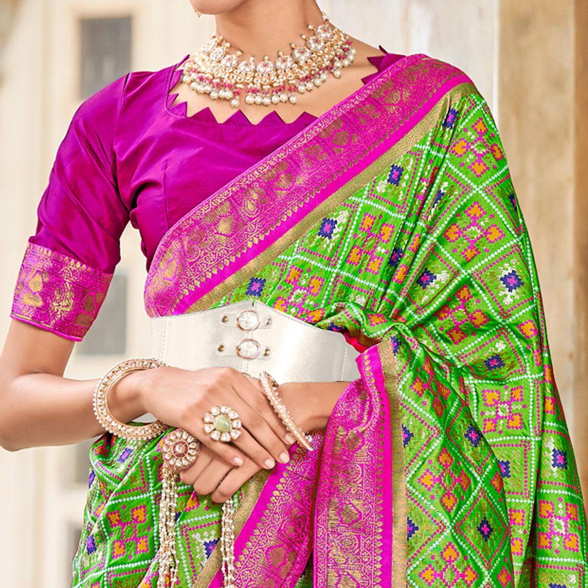 Light Green Woven Art Silk Patola Saree With Tassels