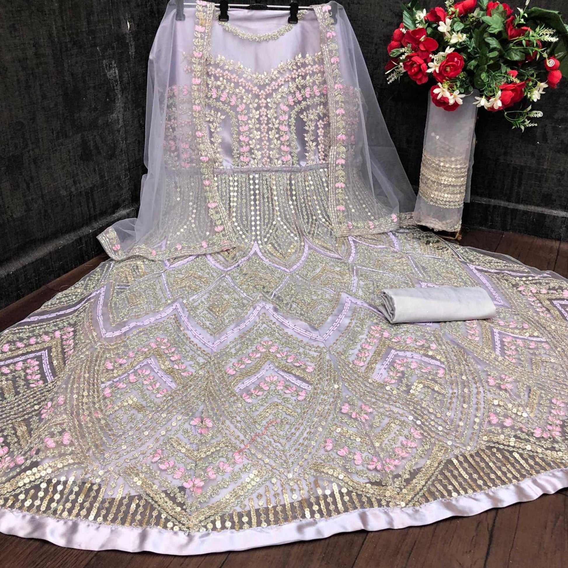 Light Lavendar Designer Partywear Embroidered Heavy Net Anarakali Suit