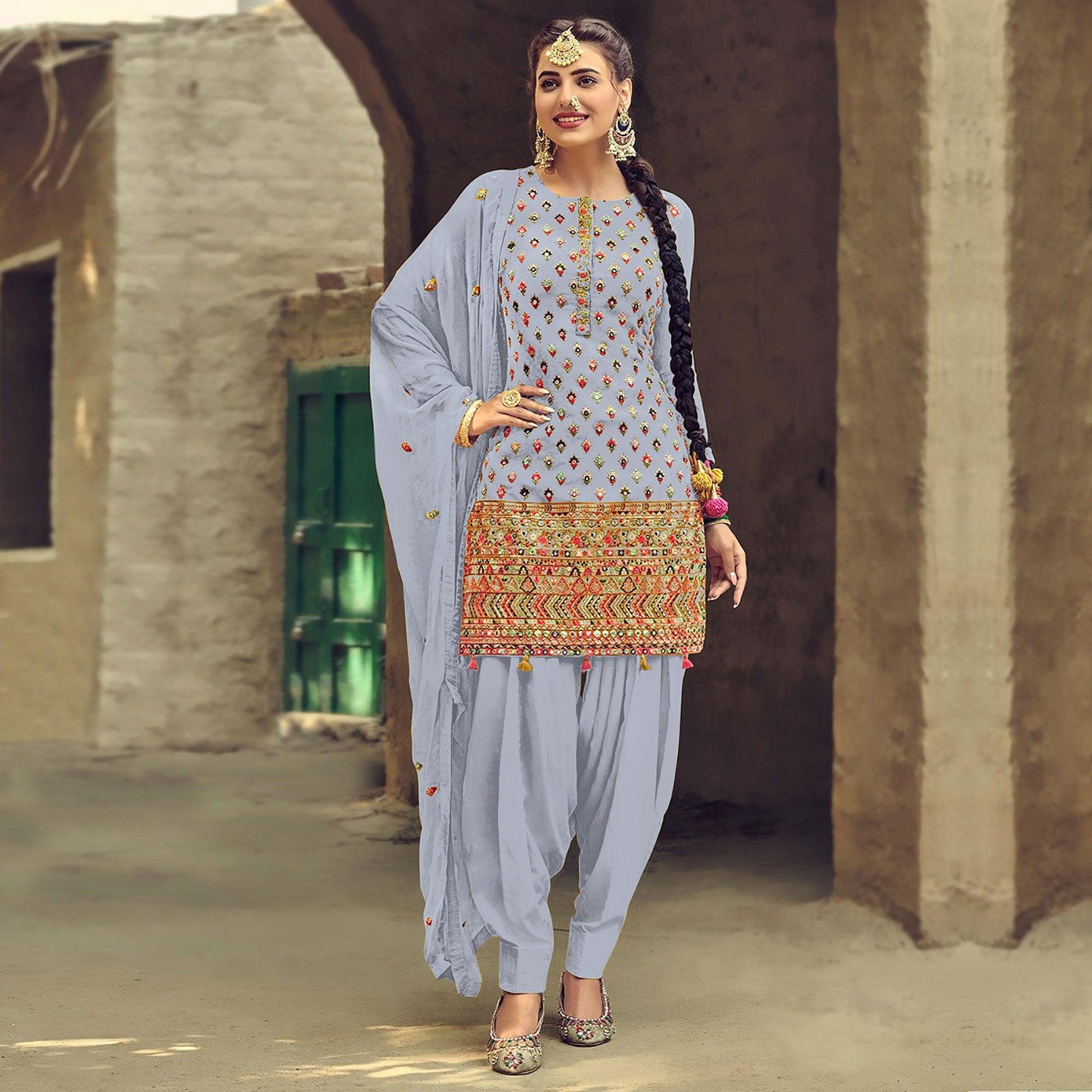 Light Lavendor Partywear Embroidered with Sequins Work Heavy Faux Georgette Patiala Suit